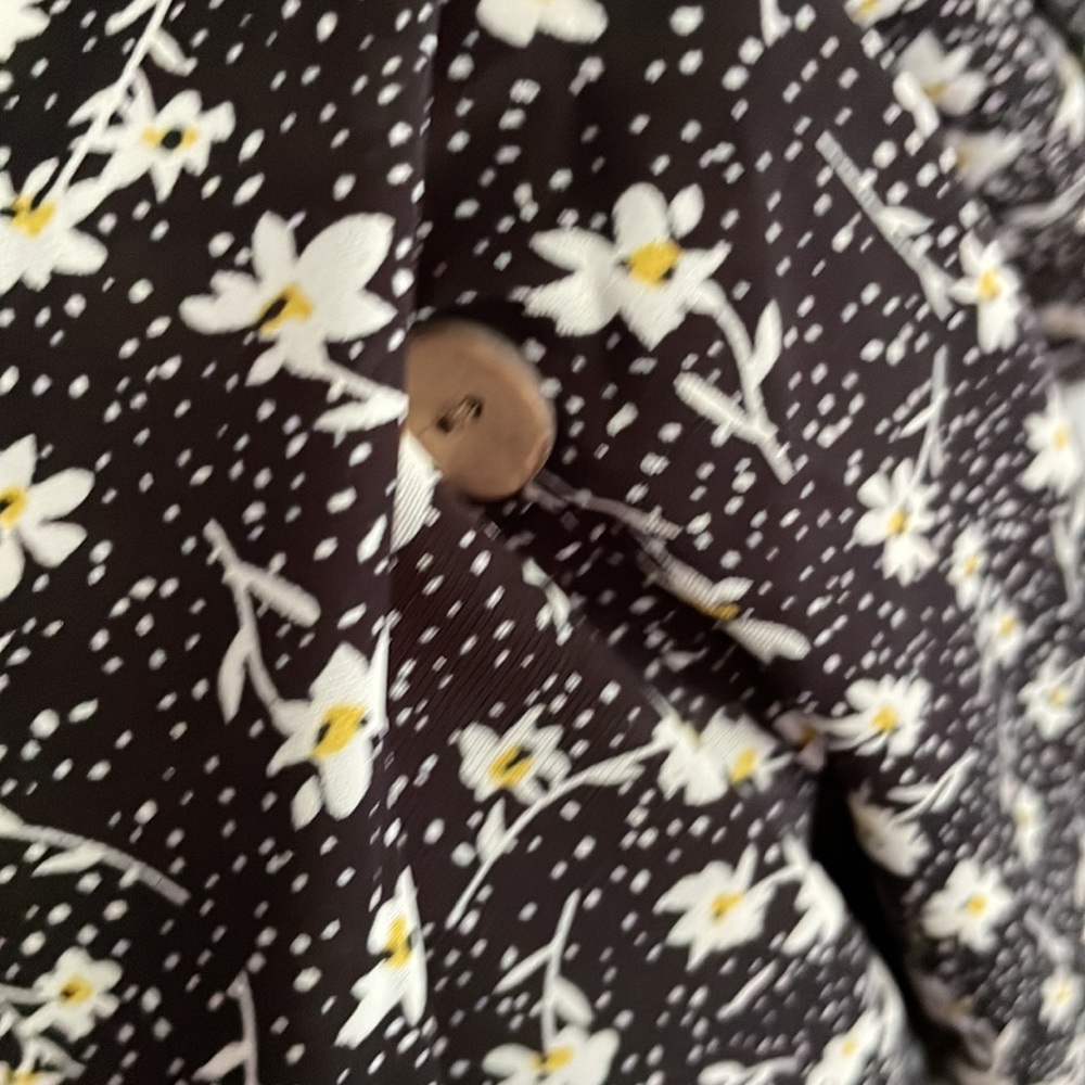 Black sun dress w/white flowers and buttons down the front. Tie waist. - Picture 6 of 7